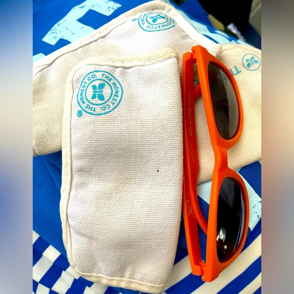 The Honest Company kids orange sunglasses with eyeglass case (two cases).